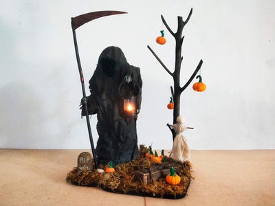 Grim Reaper With Scythe & Lantern in Graveyard Halloween Decor