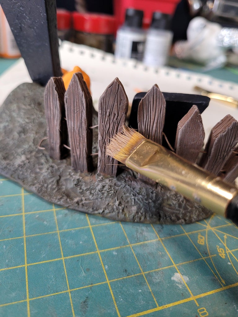 Dry Brushing the Tombstones and Fence